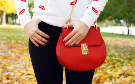Girl with red handbag