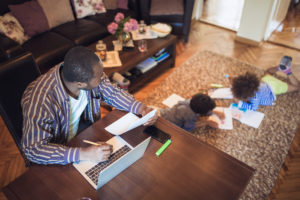 Man working from home with children