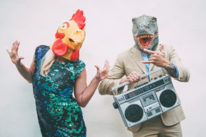 Couple dressed up for Halloween with boom box